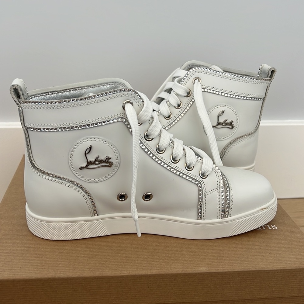 White Christian Louboutin high top sneakers